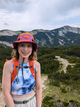 Load image into Gallery viewer, A lady stood infront of mountains
