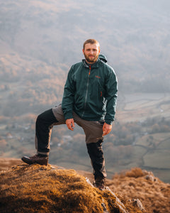 A man stood on a mountain