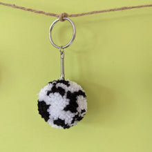 Load image into Gallery viewer, Cow Print Pom Pom Keyring
